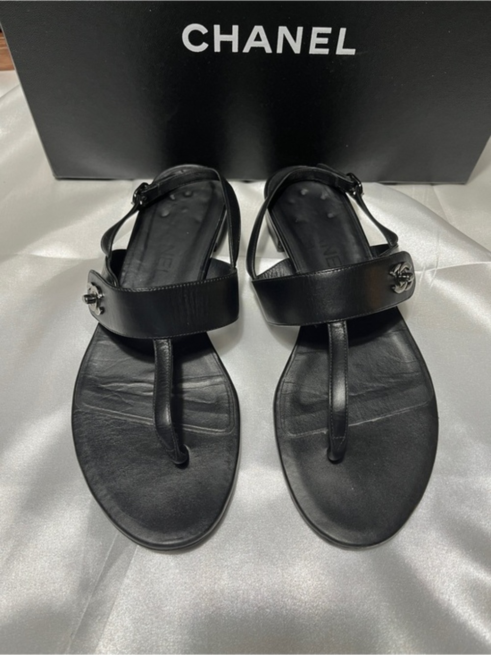 CHANEL Black Leather Thong Sandals with CC Medallion